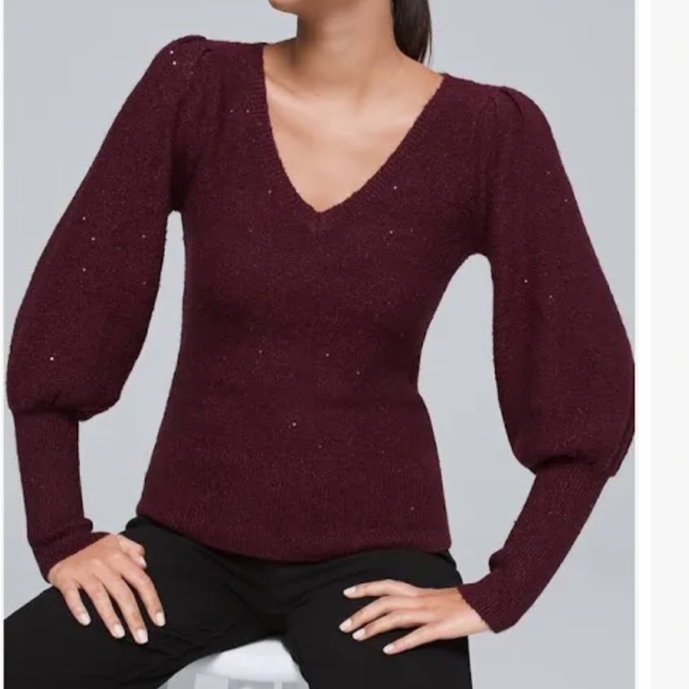White House Black Market women’s sweater size Medium. Color is burgundy.